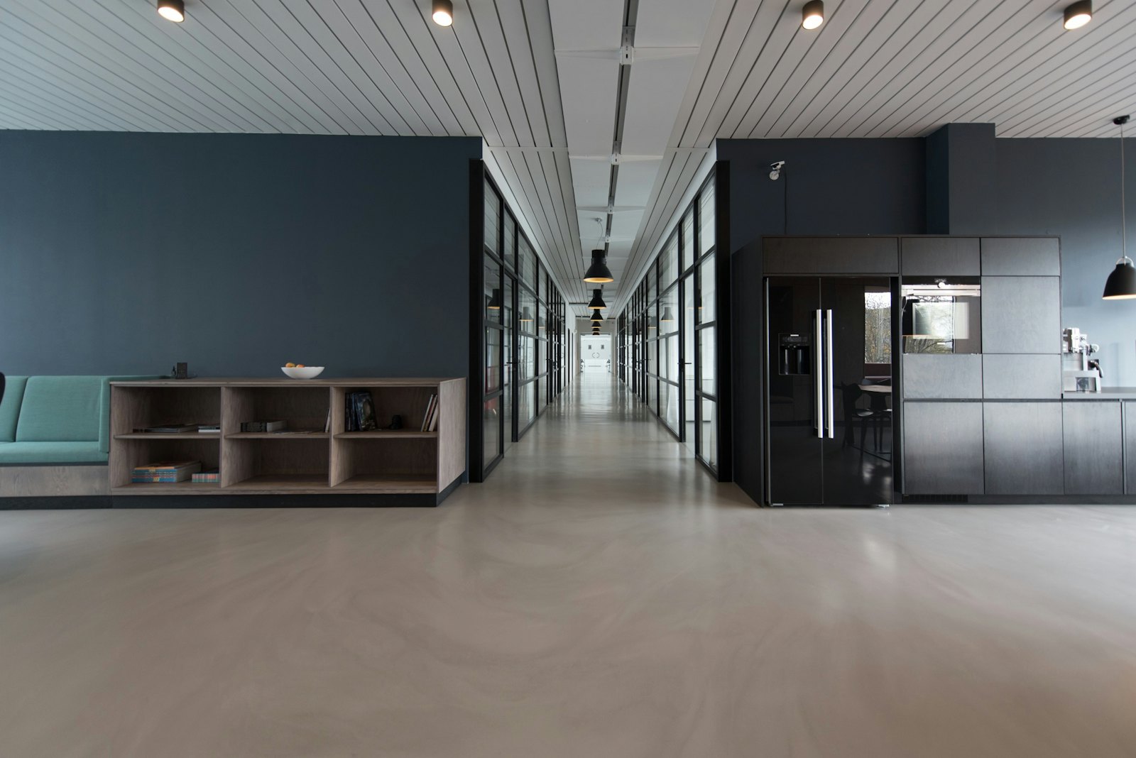 A bright, spotless office lobby with a polished floor